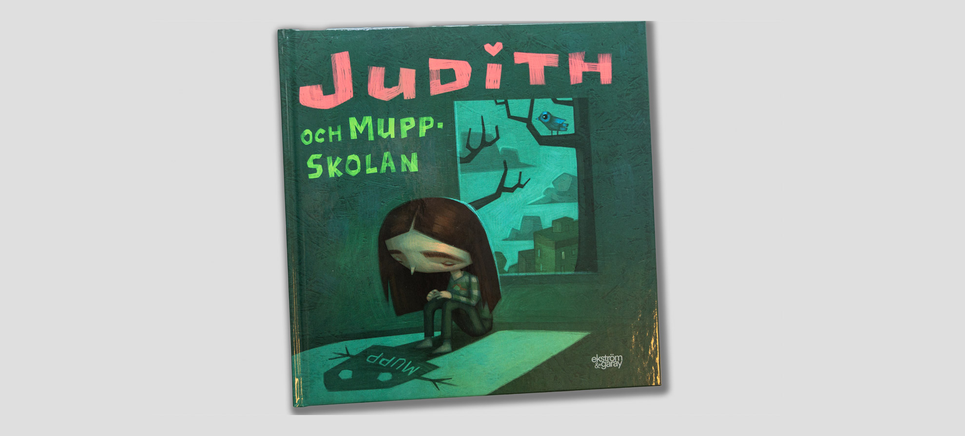 Omslaget till boken "Judith och muppskolan" av eleverna från Ekebyhovs grundsärskola.