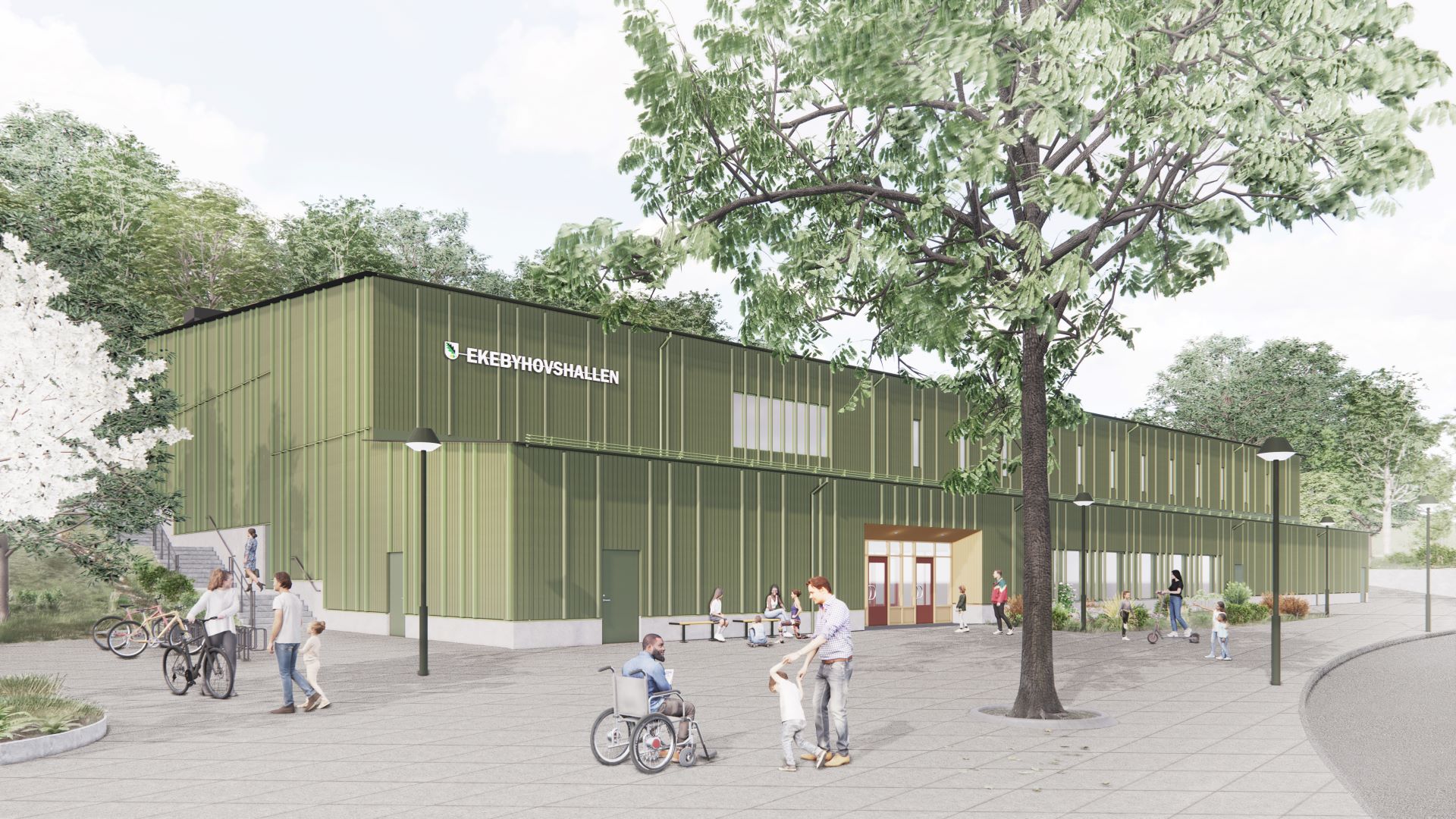 Illustration av ny idrottshall på Bryggavägen. Två våningar, träfasad i grön färg. 